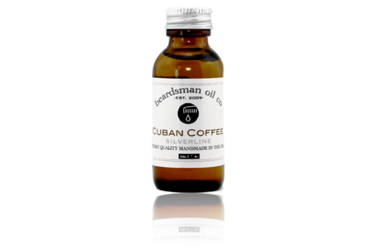 Amber glass bottle of Beardsman Oil Co Cuban Coffee beard oil with silver cap and white label.
