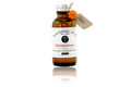 Amber glass bottle of Beardsman Oil Co limited-edition Fall seasonal beard oil with silver cap, white label, and hang tag.