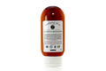Bottle of Beardsman Oil Co North Woods Beard Conditioner with white label