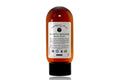 Bottle of Beardsman Oil Co North Woods Beard Wash with white label