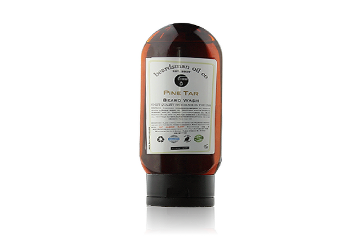 Bottle of Beardsman Oil Co Pine Tar Beard Wash with white label