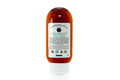 Bottle of Beardsman Oil Co Peppermint Tea Tree Beard Conditioner with white label